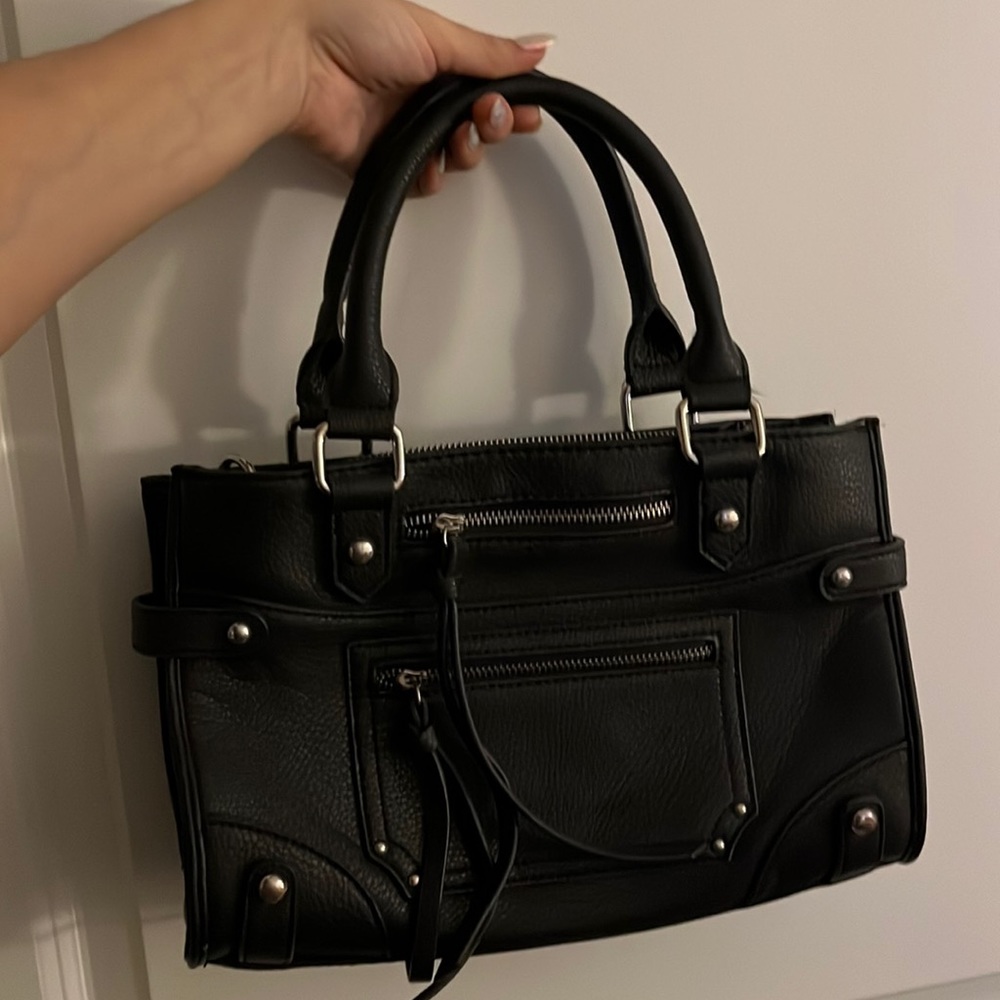 Black faux leather purse with silver accents